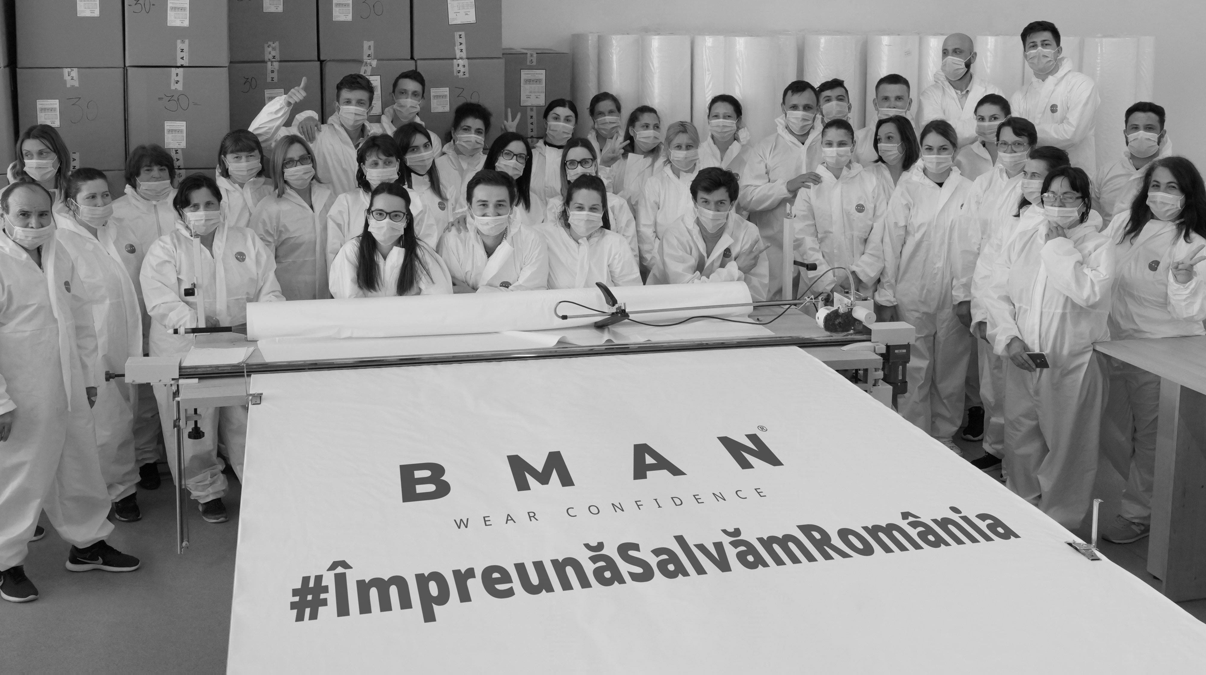 Tinerii de la Bman contribuie la salvarea Romaniei producand 2000 combinezoane pe zi